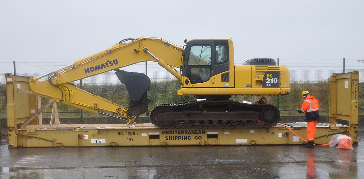 ship heavy equipment on a flat-rack